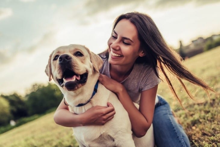 Dog Woman Hanging Dog and woman hanging out in green land